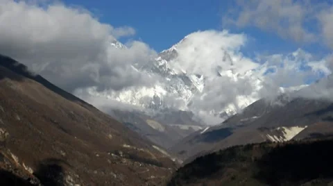 Fast moving clouds in Himalayas Nepal Stock Footage 7974929