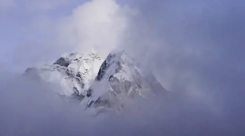 Fast moving clouds in Himalayas Nepal 動画素材 7974997