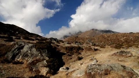 Fast moving clouds in Himalayas Nepal 動画素材 7975003