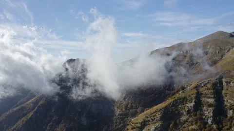 Fast moving clouds at mountain. Stock Footage 142736663