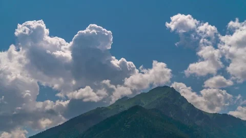 Fast moving clouds in the mountains Stock Footage 235952998