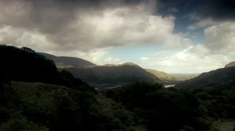 Fast moving clouds over the Irish hillside. Stock Footage 646092