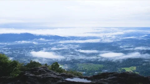 Fast moving clouds over a landscape, India 動画素材 118435618