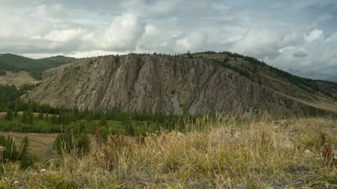 Fast moving clouds over the mountain Stock Footage 163381101