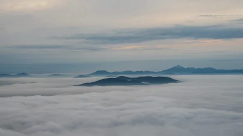Fast  moving clouds over mountains 動画素材 118578833