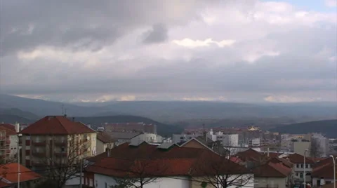 Fast moving clouds over Northern Portuguese cityscape Stock Footage 37557566