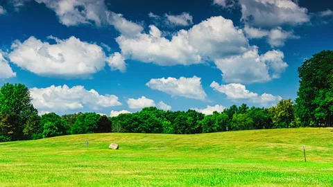 Fast Moving Clouds Over Rural Landscape - Timelapse Stock Footage 203835098