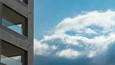 Fast moving Clouds with a part of a Building in foreground Stock Footage 149324535