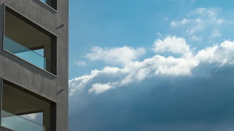 Fast moving Clouds with a part of a Building in foreground Stock Footage 149327600
