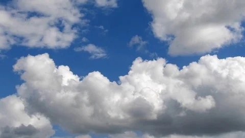 Fast moving clouds in the sky, timelapse white clouds, Stock Footage 129858252