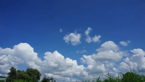 Fast-moving clouds time lapse Stock Footage 313799368