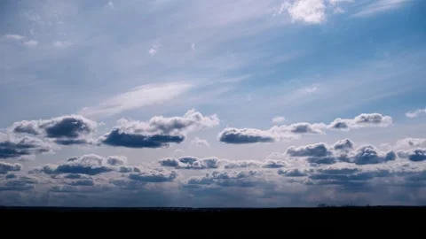 Fast-Moving Clouds Timelapse Above Dark Landscape Horizon Stock Footage 306841528