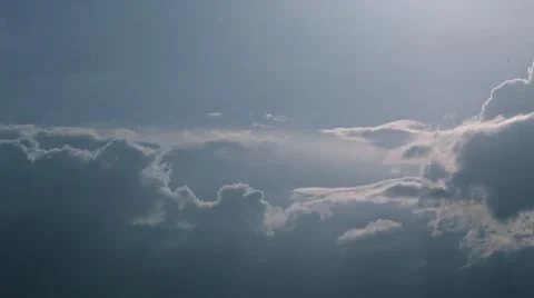Fast moving clouds turning from bright to completely black Stock-Footage 49990795