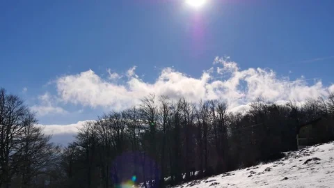 Fast moving clouds, view from mountain during winter time Video stock 71247323