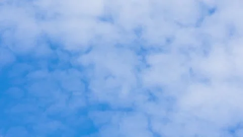 Fast Moving Cumulus clouds Over Blue Sky. Beautiful White Fluffy Clouds Stock Footage 275809990
