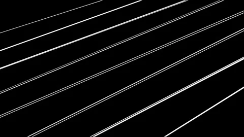 Fast moving diagonal white light rays across a deep black surface Video stock 333212902