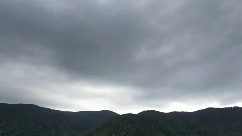 Fast Moving Dramatic Clouds on a Mountain Stock Footage 214311542