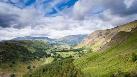 Fast Moving Dramatic Cumulus Clouds over Keswick Valley in Lake District, UK Video stock 66855735