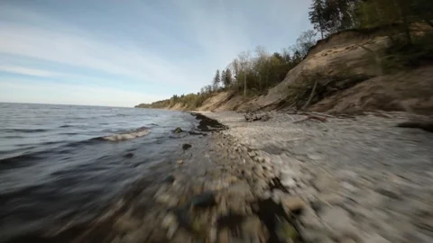 Fast moving drone seaside cliff formation Stock Footage 295487327