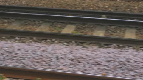 Fast Moving Iron Rail Tracks. POV on British Public Train Transportation. Stock Footage 320708337