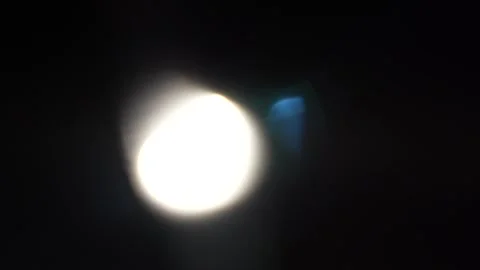 Fast moving large and small bokeh light in the dark Stock Footage 315318066