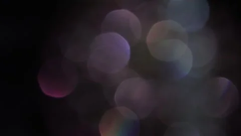 Fast moving light on colored bokeh 스톡 동영상 317456141