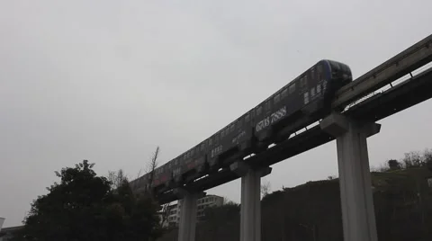 Fast moving light rail train, the carriages are painted with advertisements Stock Footage 47548829