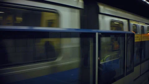 Fast moving metro train arriving passing by at the station underground  Stock Footage 204430381