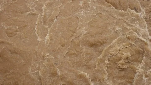 Fast moving muddy flood Stock Footage 79594839