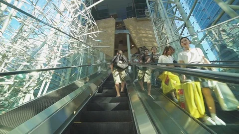 Fast moving people on escalator. Consumption, sales. Stock Footage 106991204