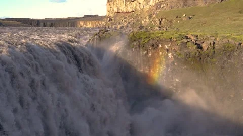 Fast Moving Powerful Waterfall Dettifoss Rainbow in Warm Sunlight in Iceland Stock Footage 256715096
