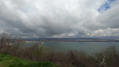 Fast moving rain clouds over the city of Varna, Bulgaria. Time lapse video. Stock Footage 238361383