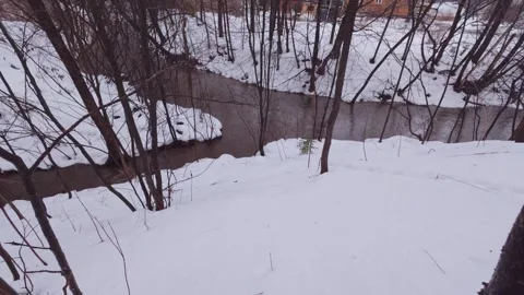 Fast moving river during rainy winter day Stock Footage 324548096