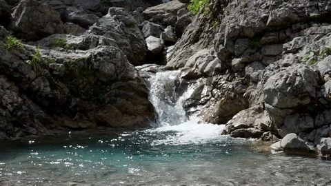 Fast moving river mountain waterfall clear water Stock Footage 96062368