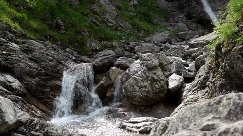 Fast moving river mountain waterfall clear water Stock Footage 96062410