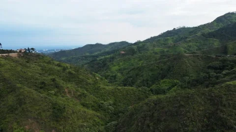 A fast moving shot moving forward over a mountainous area Stock Footage 165175898