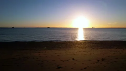 Fast Moving Sideways Along The Beach During Sunrise Stock Footage 168806283