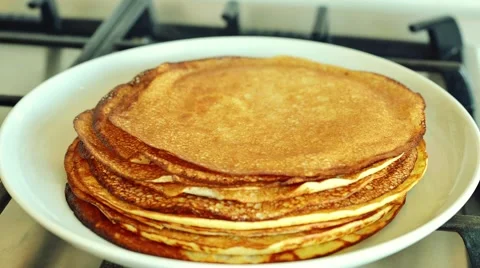 Fast moving stacking Pancakes in a plate, timelapse Stock-Footage 41729543