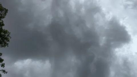Fast moving storm clouds with flashes of lightning Stock Footage 337054388