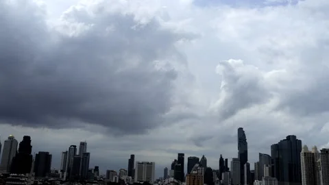 Fast-moving storm clouds gather over the Bangkok skyline Stock Footage 339784010