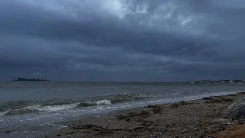 Fast Moving Storm Clouds Over Island and Beach Time Lapse Stock Footage 137036483