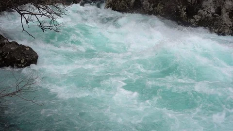 A fast-moving stream of the mountain river Stock-Footage 72424994