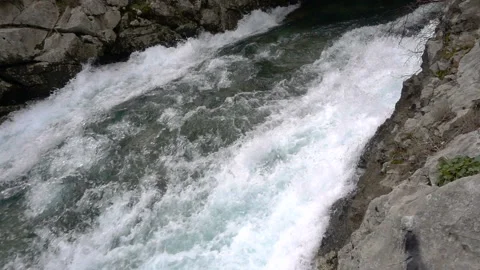 A fast-moving stream of the mountain river Stock Footage 100808228