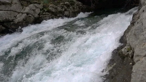 A fast-moving stream of the mountain river Stock Footage 100812327