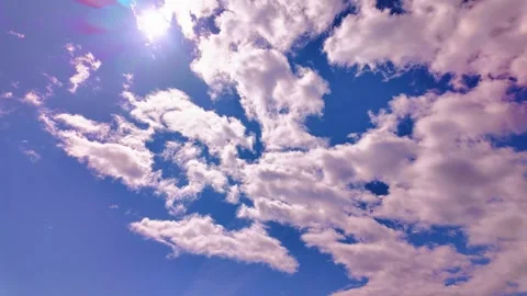 Fast moving timelapse with fluffy white clouds Stock Footage 316345230