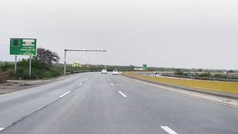Fast moving traffic on motor way M2 in Islamabad, Pakistan on May 20, 2025. Stock-Footage 310352079