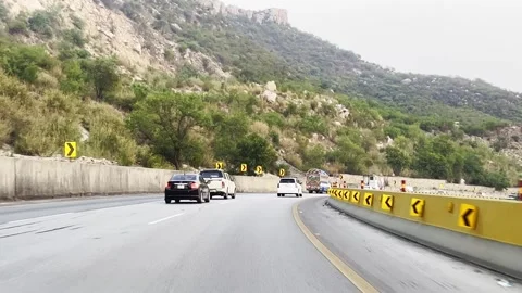 Fast moving traffic on motor way M2 in Islamabad, Pakistan on May 20, 2025. Stock Footage 310396161