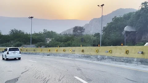 Fast moving traffic on motor way M2 in Islamabad, Pakistan on May 20, 2025. Stock Footage 310410261