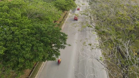 Fast moving traffic, traffic flow, vehicles along a motorway Persiaran Shorea Stock Footage 230516260