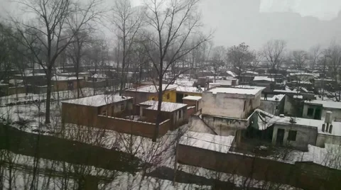 Fast moving train going through a small village in the great North China Plain Stock Footage 46842106